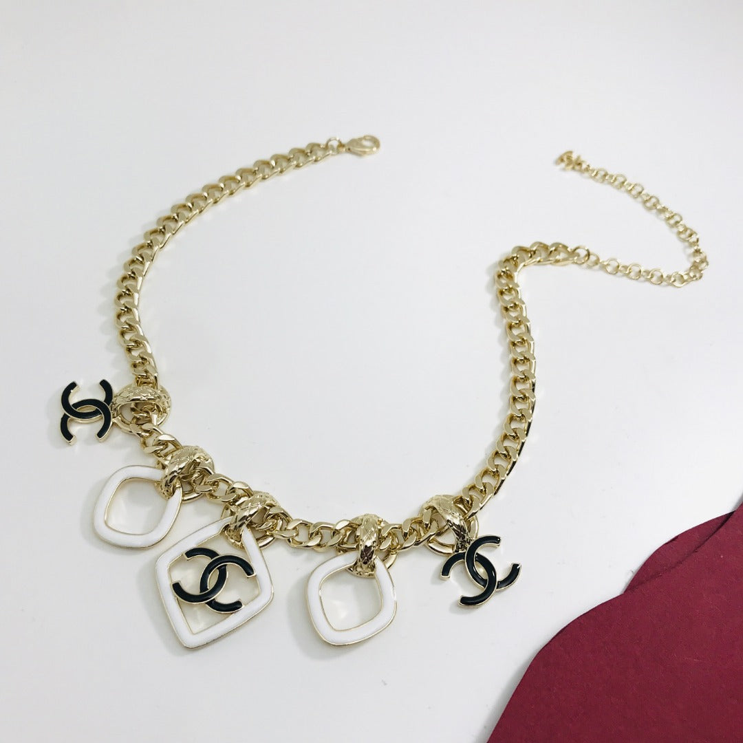 MULTI CHARM ROSE GOLD  BLACK ENAMEL NECKLACE