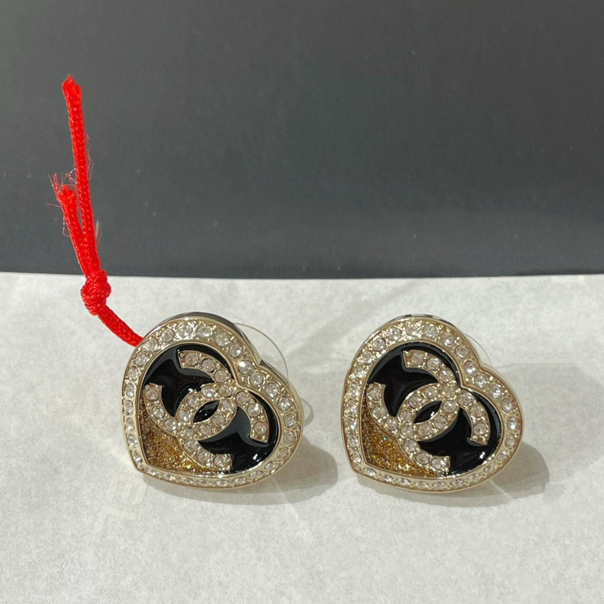 CC DIAMOND PAVED HEART BLACK ENAMEL STUD EARRINGS