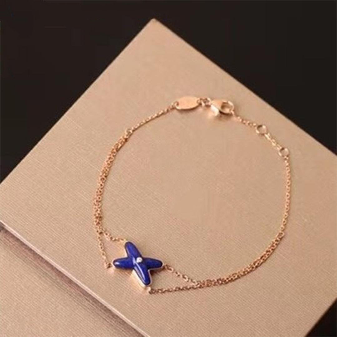 HOLLOW DESIGN FOUR-LEAF CLOVER FLOWER SHAPE RING